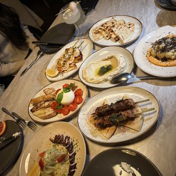 Amavi - Grilled octopus, burrata, chicken and shrimp skewers, hummus and cauliflower. - Mediterranean Near Me - New York, New York