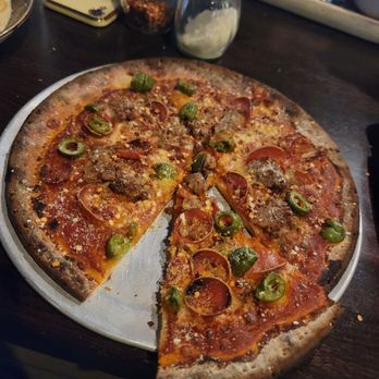 Red Rabbit - This was the "Family's Favorite" which was red sauce, mozzarella, house sausage, pepperoni, and green olives - Italian Near Me - St Paul, Minnesota Red Rabbit - This was the "Family's Favorite" which was red sauce, mozzarella, house sausage, pepperoni, and green olives - Italian Near Me - St Paul, Minnesota
