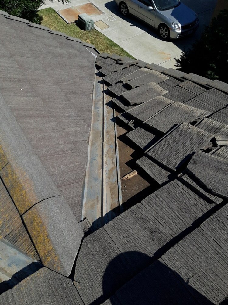 Slide of RidgeValley Roofing