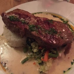 Restaurant Kj Minh - Et stykke oksekød på ris og kokos sauce....