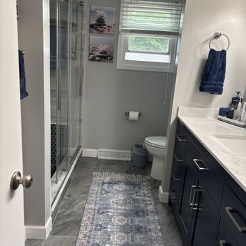Floor Essence - The bathroom floor tiles & vanity - Flooring Near Me