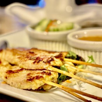Siam Garden - "Sate" Pork on a stick with peanut dipping sauce. Excellent. A must Order. - Thai Near Me - St. Petersburg, Florida Siam Garden - "Sate" Pork on a stick with peanut dipping sauce. Excellent. A must Order. - Thai Near Me - St. Petersburg, Florida