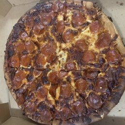 Waited 1.5 hours for this hard rock of a pizza