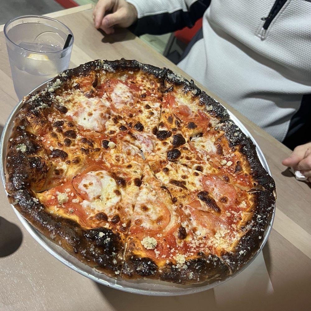 Not wood fired, wood burnt to shit!! Need to fire the pizza cook not the pizza. Not wood fired, wood burnt to shit!! Need to fire the pizza cook not the pizza.