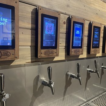 Pour 54 Taphouse - a row of beer taps - Beer Bar Near Me - Rapid City, South Dakota Pour 54 Taphouse - a row of beer taps - Beer Bar Near Me - Rapid City, South Dakota