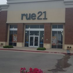 Rue 21 - This place is trash. Clean stuff off countertops and floor. Have class