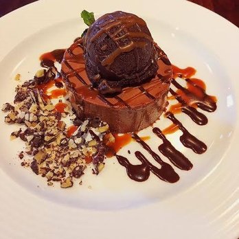 North Square - Chocolate roulade with dark chocolate gelato and caramel sauce...mmmmmmmmmmmm!! - New American Near Me - New York, New York North Square - Chocolate roulade with dark chocolate gelato and caramel sauce...mmmmmmmmmmmm!! - New American Near Me - New York, New York