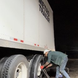 Bolo’s Mobile Tire Service - BOLO'S MOBILE TIRE SERVICE providing nighttime Metro semi-trailer tire assistance at a large distribution center. 24/7 mobile tire service.