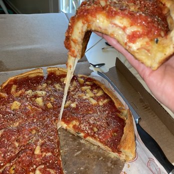 Nancy’s Pizzeria - The cheese pull - Pizza Near Me - Columbus, Georgia