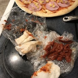 Papa Murphy's - WAY too much sauce for what was supposed to be a "light" sauce pizza and wet rags I had to use to wipe sauce off the crust and cardboard.