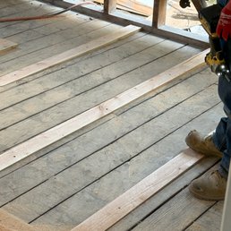 Cutting custom shims for the new sub-floor.