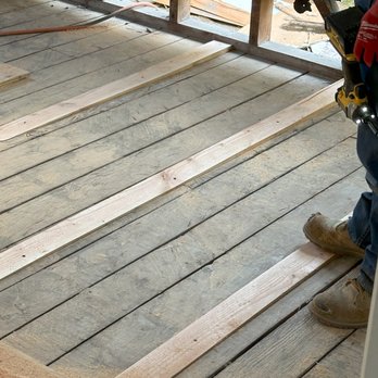 Alpha Structural, Inc. Orange County - Cutting custom shims for the new sub-floor. - Foundation Repair Near Me - Yorba Linda, California