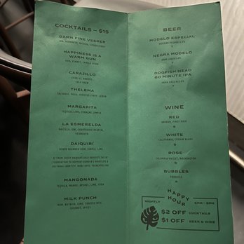 Emerald Eye  - A green menu listing cocktails, beer, wine, and bubbles at Emerald Eye bar in Denver, featuring seasonal drinks and drink specials. - Lounges Near Me - Denver, Colorado