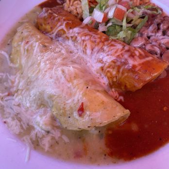 La Cueva Cafe - Chicken enchiladas with red and green chili sauce. - Mexican Near Me - Taos, New Mexico La Cueva Cafe - Chicken enchiladas with red and green chili sauce. - Mexican Near Me - Taos, New Mexico