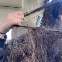 One of the MANY knots left in my hair.