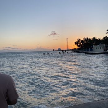 Seaside Cafe - Sunset on the dock right next to the restaurant - Pizza Near Me - Key West, Florida Seaside Cafe - Sunset on the dock right next to the restaurant - Pizza Near Me - Key West, Florida