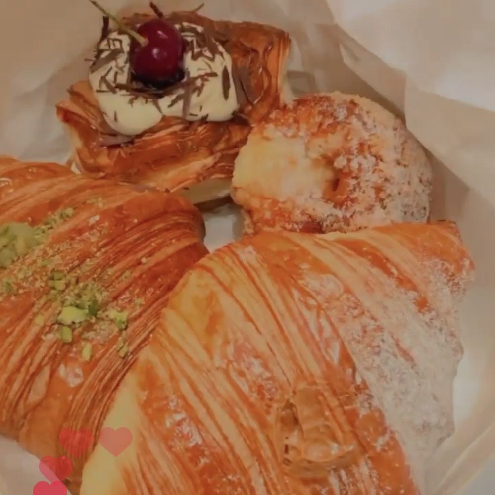 Le Beau - Pistachio cream and dulce de leche croissants, alon with brioches.  Very beautiful and appetizing, but not extraordinary. - Patisserie/Cake Shop Near Me - Toronto, Ontario