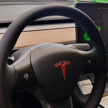 Royalty Wraps & Tint - Red 3M Decal on Steering wheel - Car Window Tinting Near Me - Costa Mesa, California Royalty Wraps & Tint - Red 3M Decal on Steering wheel - Car Window Tinting Near Me - Costa Mesa, California