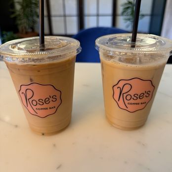 Rose’s Coffee Bar - Left regular iced latte with almond milk and an extra shot. Right is a regular vanilla latte - Coffee & Tea Near Me - Fort Lauderdale, Florida Rose’s Coffee Bar - Left regular iced latte with almond milk and an extra shot. Right is a regular vanilla latte - Coffee & Tea Near Me - Fort Lauderdale, Florida