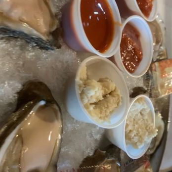 Storming Crab - Oysters with a side of blonde hair - Seafood Near Me - Louisville, Kentucky