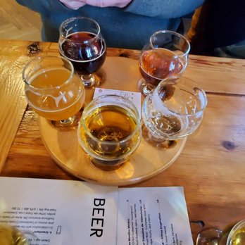 Bell Tower Brewing - Flights! Love the round flight board. - Brewpubs Near Me - Kent, Ohio Bell Tower Brewing - Flights! Love the round flight board. - Brewpubs Near Me - Kent, Ohio