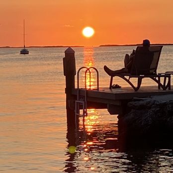 Bayside Inn Key Largo - Sunset at the end of the dock, nice chairs - Venues & Event Spaces Near Me - Key Largo, Florida