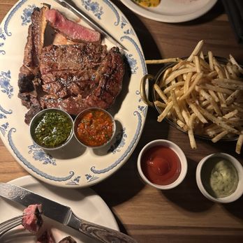 El Che Steakhouse & Bar - Bone-In Ribeye 22 oz. Prime Dry Aged 45 Days  Beef Pat Fries  Lobster butter - Argentine Near Me - Chicago, Illinois
