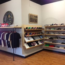 Bakersfield Skateboard Company - Sale rack, hats and shoes displays.