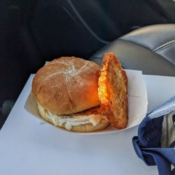 Tom's Place - Sausage, Egg and cheese on a hard roll. Hash brown on the side.
