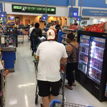 Walmart Supercenter - Every line in the store is backed up to the middle where islands are. This place is like this every single time I come here. Awful - Department Stores Near Me - Lexington, Kentucky