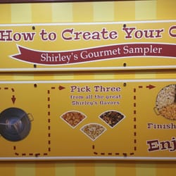 Shirley's Gourmet Popcorn Company - They have several tin sizes to fit your love for popcorn.
