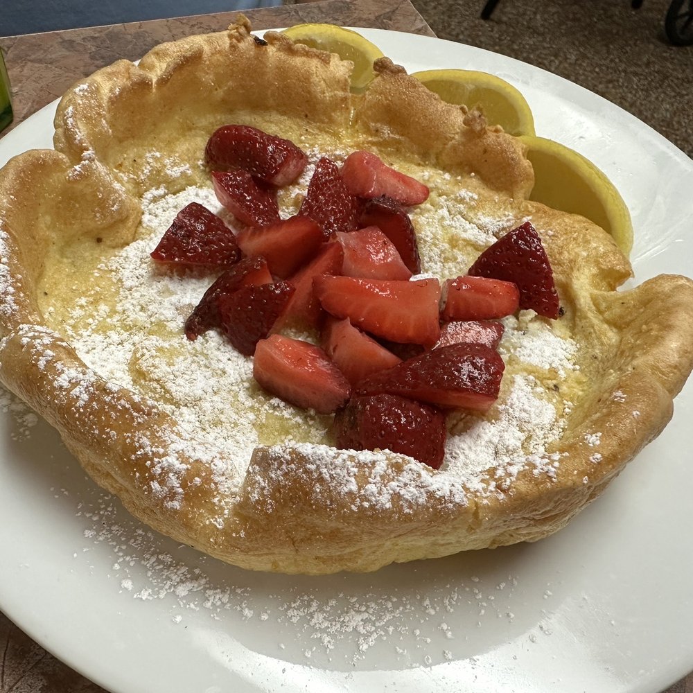 Ye Olde Pancake Station - Crispy yet soft Dutch baby with fresh strawberries - Breakfast & Brunch Near Me - Amarillo, Texas Ye Olde Pancake Station - Crispy yet soft Dutch baby with fresh strawberries - Breakfast & Brunch Near Me - Amarillo, Texas