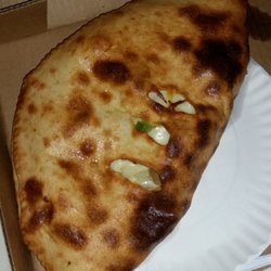 Alex Pizza - You can order your (massive!) calzone with whatever ingredients you want.