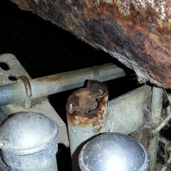 Colby Kennels - Jagged fence posts on a kennel gate that could cut a dog likena rusty serrated knife. - Pet Sitting Near Me - Vails Gate, New York