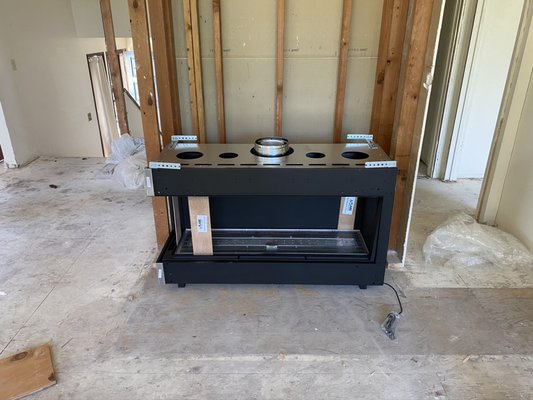 Flare Modern Fireplace right corner unit - This unit has two sides of glass for viewing from any angle! It also has an over head heat release so you can safely hang your TV above the fireplace! Want to run it in the summer? No problem have us install the summer vent kit to send the heat to the outside or to another room! Double glass feature insures that kids and pets will never get burned!  We have see through models, inside outside kits to install on exterior walls, peninsula models, passage way models, corner units, and more!