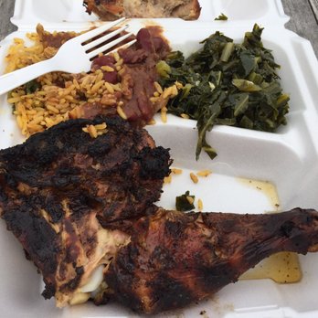 Jules Caribbean BBQ - a white styrofoam container with meat, rice, and greens - Caribbean Near Me - Waterford, Virginia
