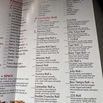 Guji - The menu page displays a list of sushi rolls and specialty dishes, including Rainbow Roll, California Roll, and Spicy Tuna, with descriptions of ingredients and preparation styles. It is printed on white paper with red headings and black text, and includes some handwritten marks or checkmarks next to certain items. - Japanese Near Me - Orange, Connecticut