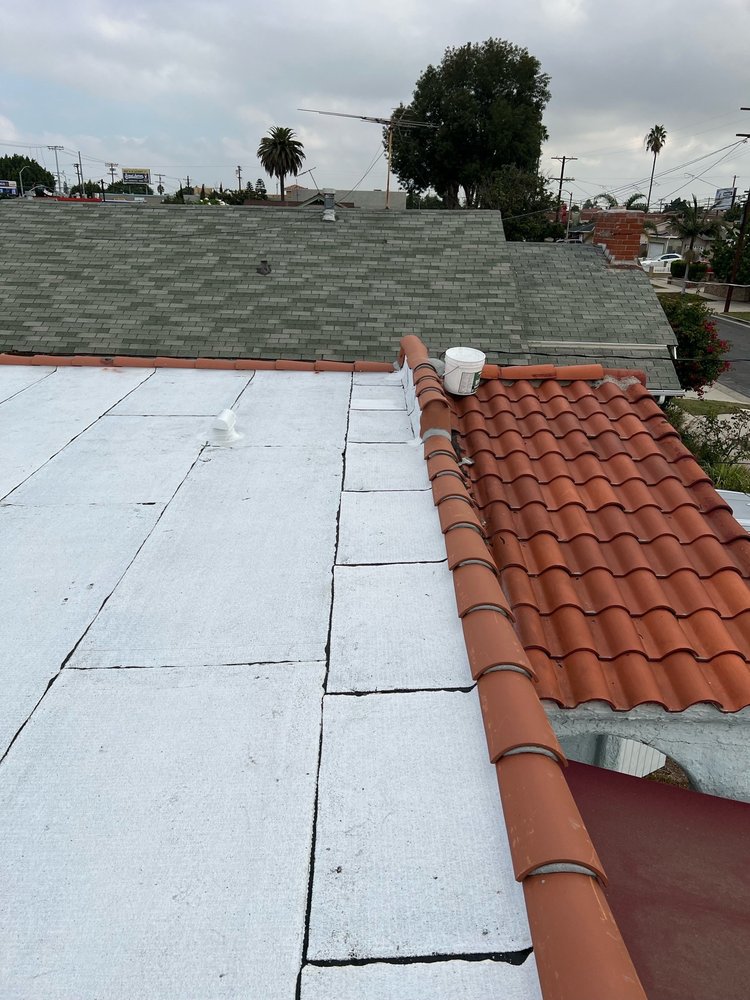 Slide of JMT Roofing