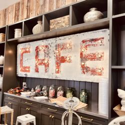Beljar Home - Sign behind counter