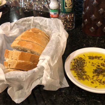 Carrabba's Italian Grill - Warm bread and dipping oil - Italian Near Me - Delray Beach, Florida
