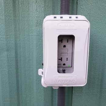 The Electric Company - Close up of GFCI outlet connected to switch box. - Electricians Near Me The Electric Company - Close up of GFCI outlet connected to switch box. - Electricians Near Me