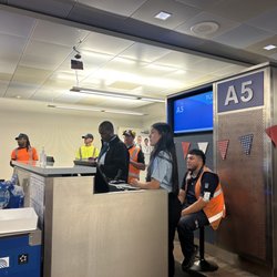United Airlines - They multiplied two of the most useless United employees! Can't rebook you, you have to call the 1800 number!
