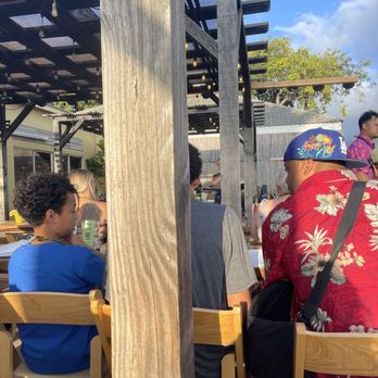 Gilligans Bar & Grill - My view of the luau. - Bars Near Me - Kihei, Hawaii Gilligans Bar & Grill - My view of the luau. - Bars Near Me - Kihei, Hawaii
