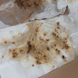 2 of several paper towels used to clean chili flakes from chicken. 2 of several paper towels used to clean chili flakes from chicken.