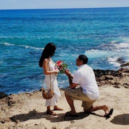 Vow renewal ceremony at shipwreck beach surrounded by sea turtles Vow renewal ceremony at shipwreck beach surrounded by sea turtles