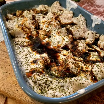 Miss Cafe - Turkish Dumplings with Sumac yogurt butter sauce - Turkish Near Me - Seattle, Washington
