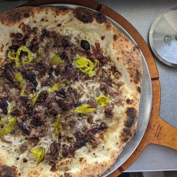 Pizzeria Nomad - Brisket Pie - Pizza Near Me - Amarillo, Texas Pizzeria Nomad - Brisket Pie - Pizza Near Me - Amarillo, Texas