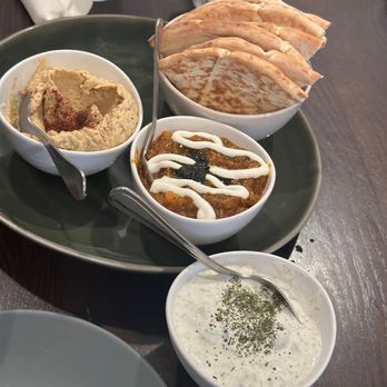 Maydoon - Dip Trio (hummus, kashkeh bodemjan, & must khiar with pita bread) - $15 - Persian/Iranian Near Me - Sacramento, California Maydoon - Dip Trio (hummus, kashkeh bodemjan, & must khiar with pita bread) - $15 - Persian/Iranian Near Me - Sacramento, California