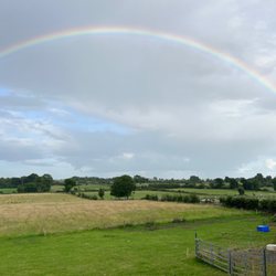 The Lakes Wellness B&B - A full rainbow as viewed from the upstairs window