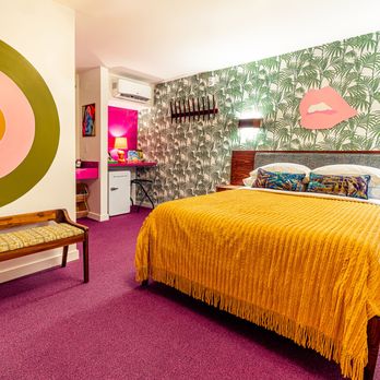 Classen Inn - Half of our rooms are pretty in pink! - Hotels Near Me - Oklahoma City, Oklahoma
